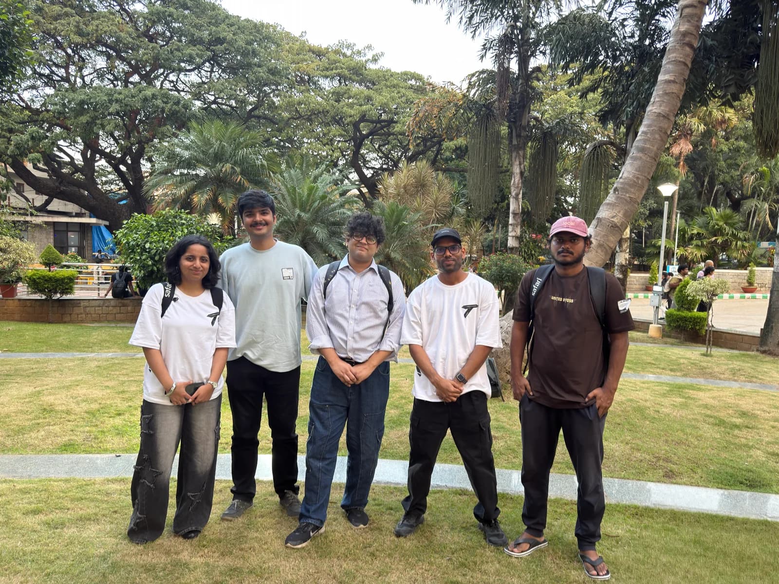 The five members of the Tiles Privacy team standing together outdoors.
